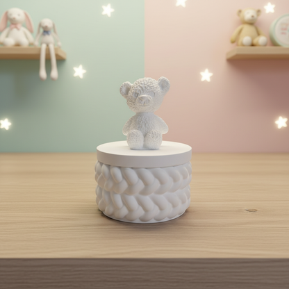 White plaster teddy bear trinket box in soft nursery setting