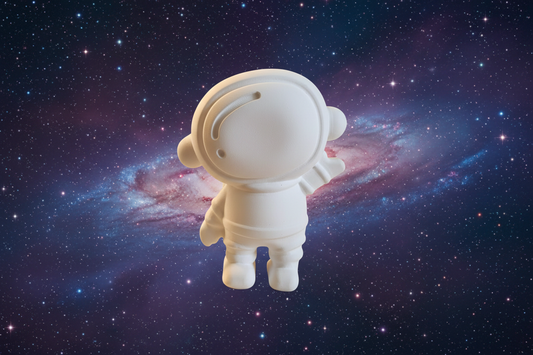 Paint Your Own Plaster Astronaut with galaxy nebula background