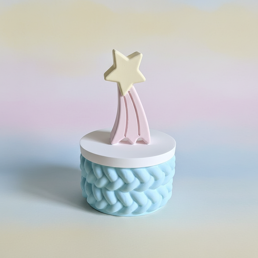 Painted pale lemon shooting star trinket box with baby blue base on soft pastel lemon pink and blue gradient background